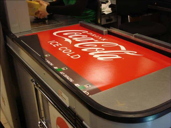 conveyor belt advertising for Coca Cola by Beltmedia.co.uk