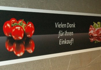 conveyor belt advertising fruit and vegetables